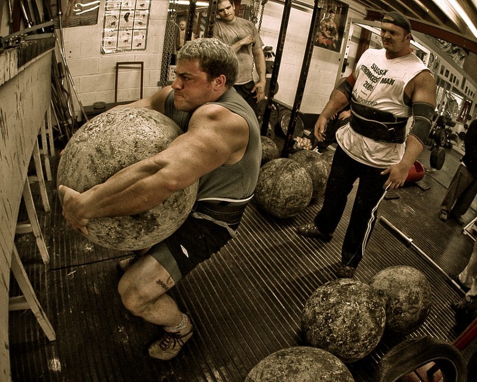 Man-Lifting-Heavy-Stone
