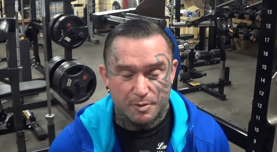 Lee Priest wearing a blue shirt