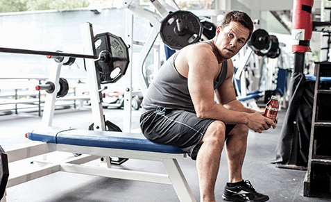 Mark Wahlberg sitting on a bench
