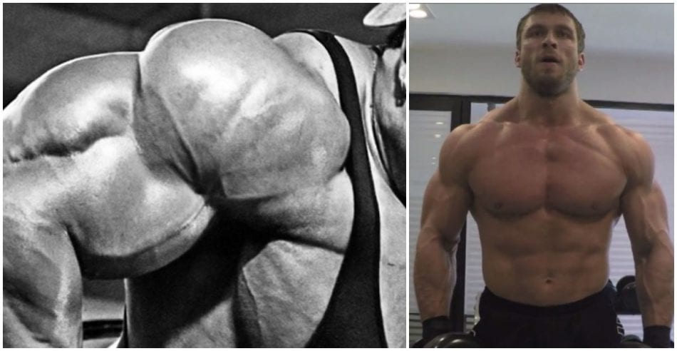 Dmitry Klokov standing in front of it