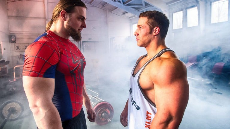 strongman and bodybuilder competing