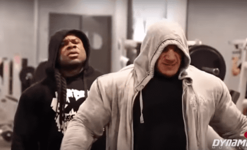 Kai Greene standing in a room